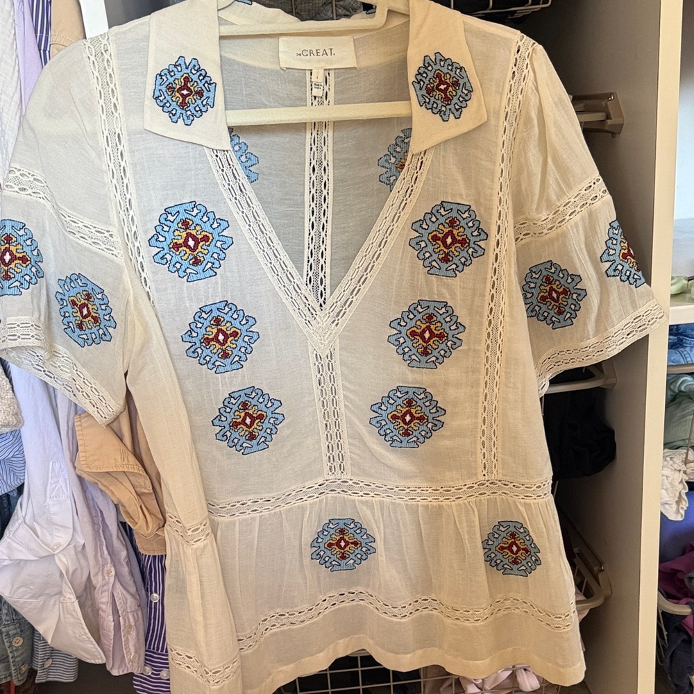 THE GREAT. Cream Blouse with Blue and Red Embroidery